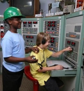 Children experiencing the Space Walk of Fame museum exhibit