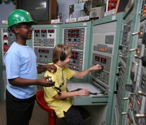 Children experiencing the Space Walk of Fame museum exhibit